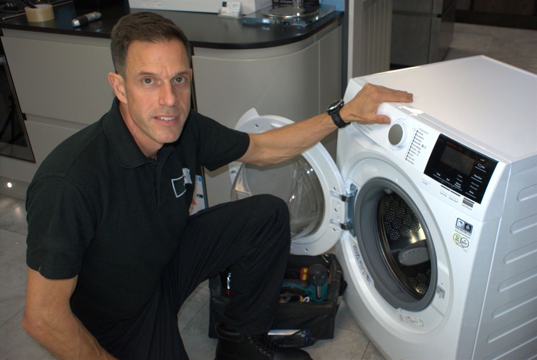 Completed washing machine repair in a Dubai home
